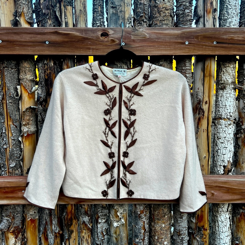 Vintage sweater with intricate details. Works nicely with both dresses and jeans